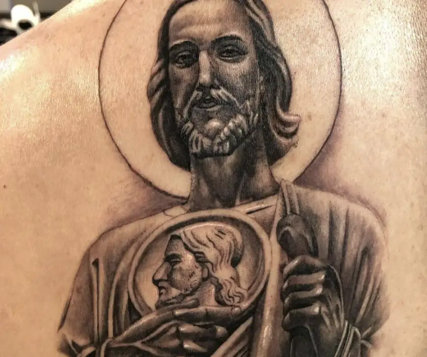 Inking of the cross of San Judas Tattoo