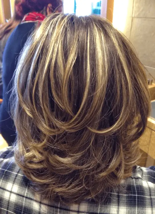 Medium Layered Haircuts with Subtle Highlights