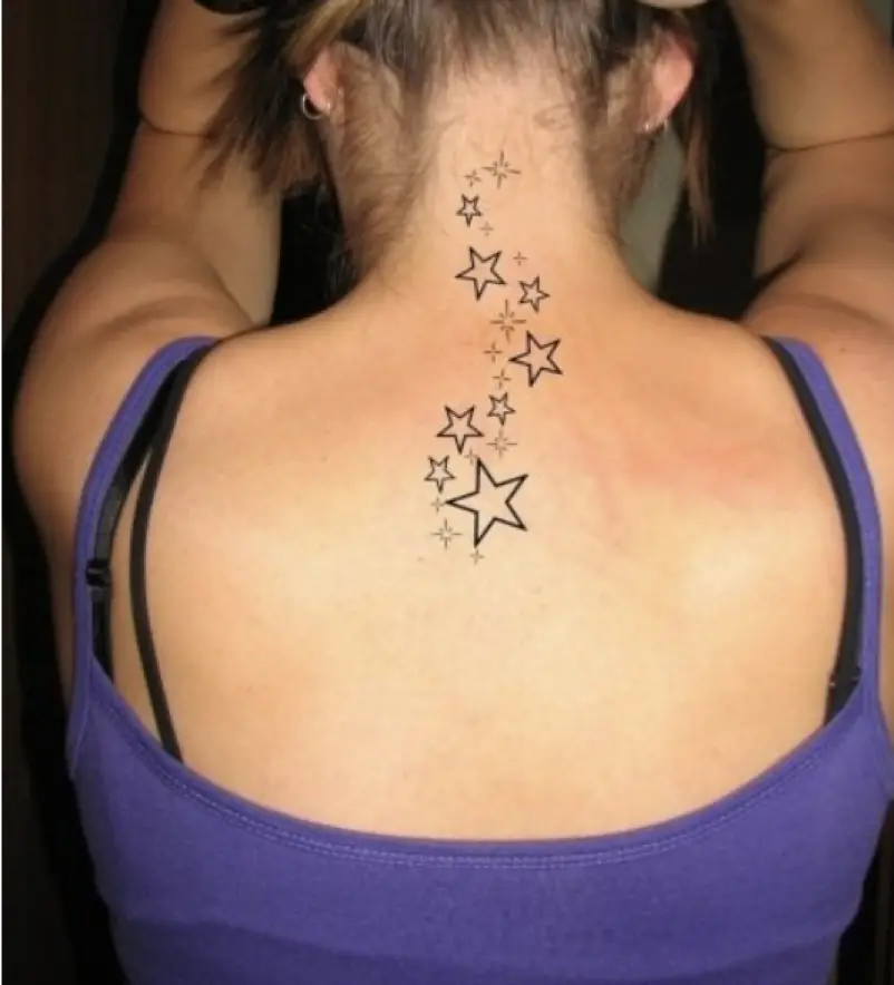 Women Back Tattoo Star