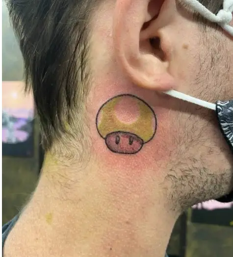 Ear Piercing Mushroom Tattoo
