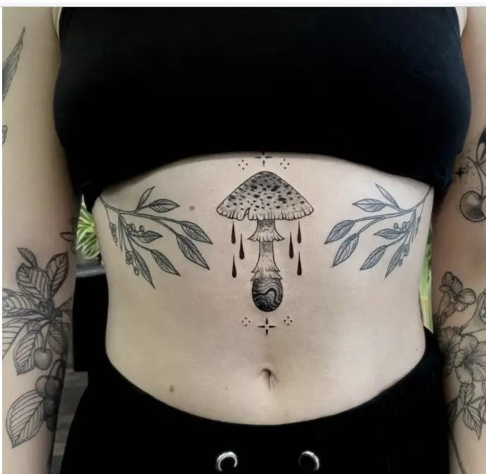 Black Ink Chest Mushroom Tattoo