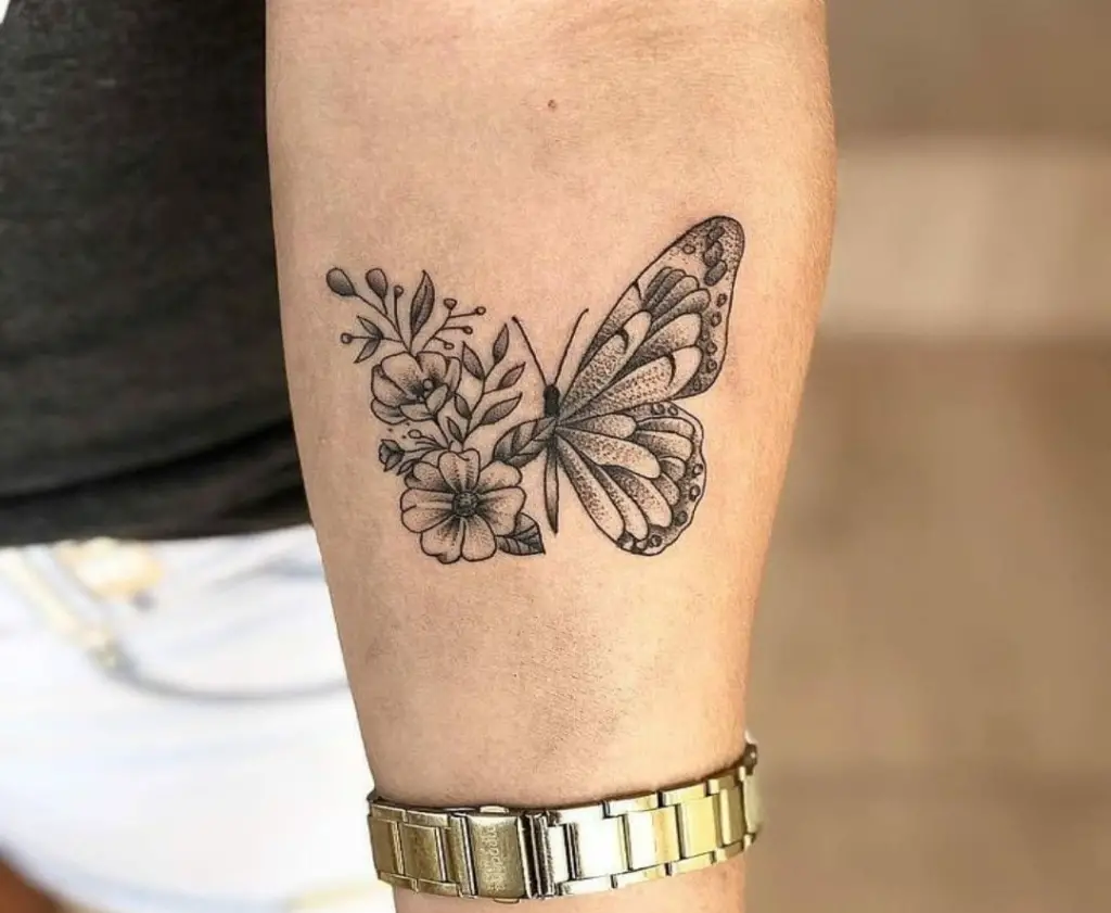 Tattoo of Small Flowers and Butterflies
