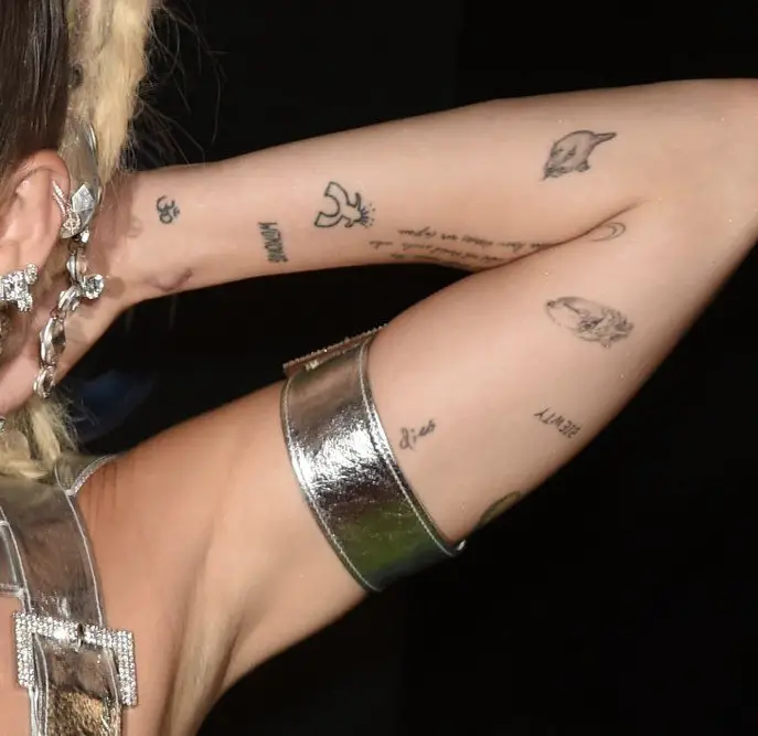 Tattoo on Miley Cyrus Biceps