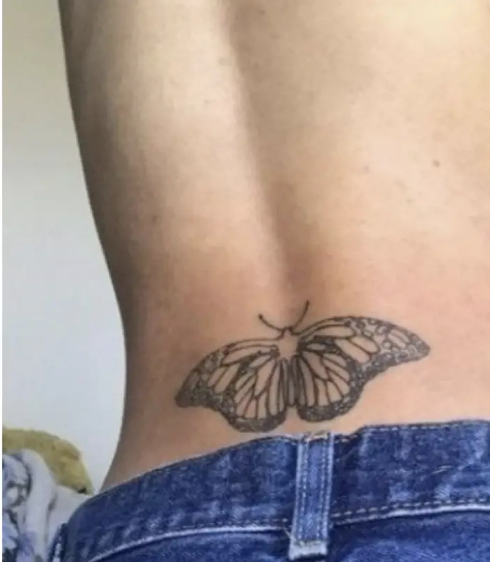 Women Lower Back Tattoo